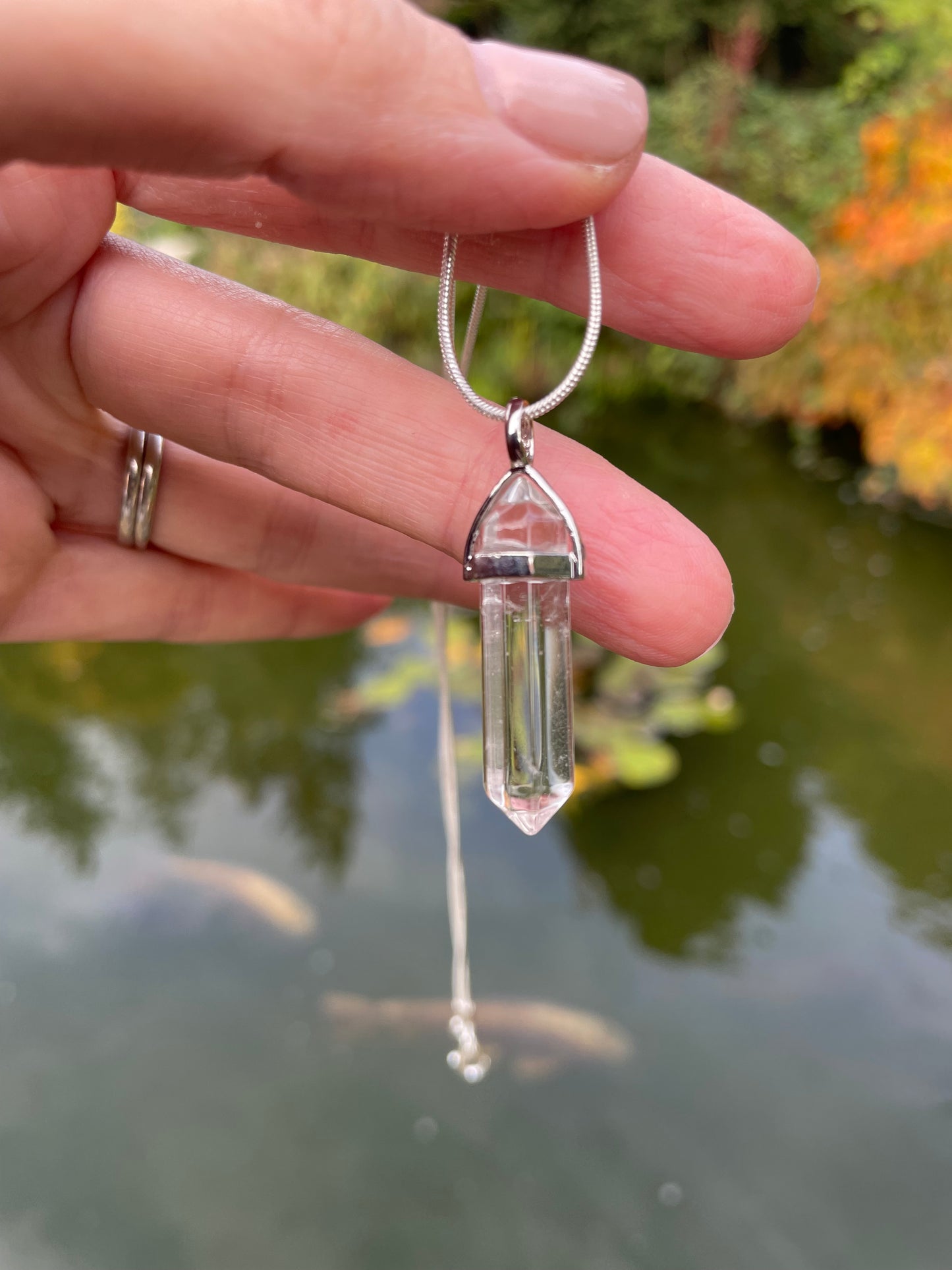 mini quartz crystal wand necklace with a chain