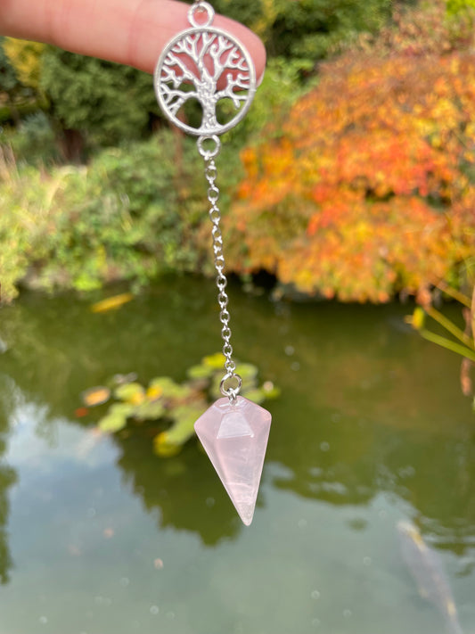 Rose quartz pendulum photographed by water