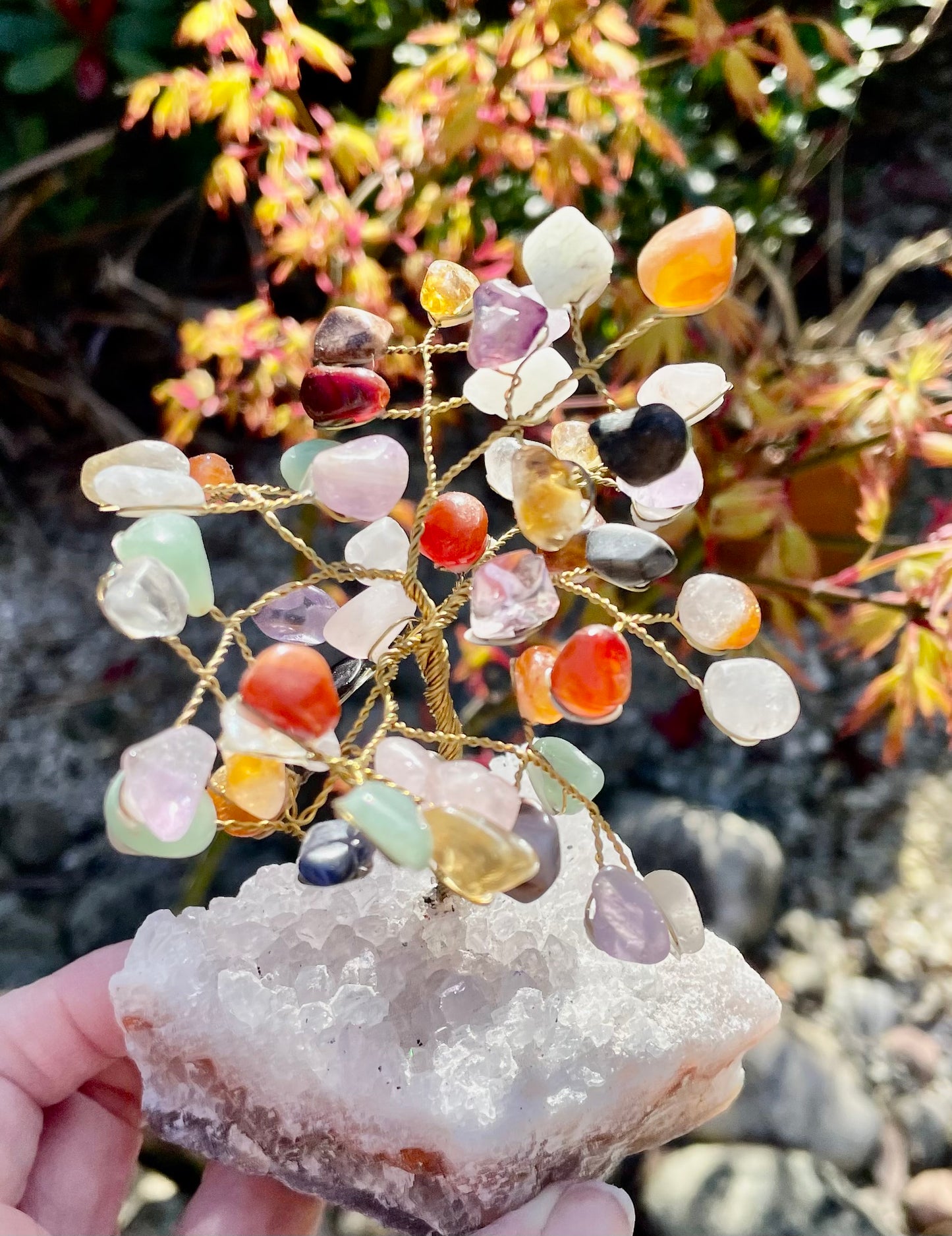 alt tag: Multi coloured tumble stone crystal tree with amethyst rough base